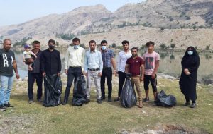 پاکسازی حاشیه دریاچه سد شهید عباسپور در اندیکا +تصاویر